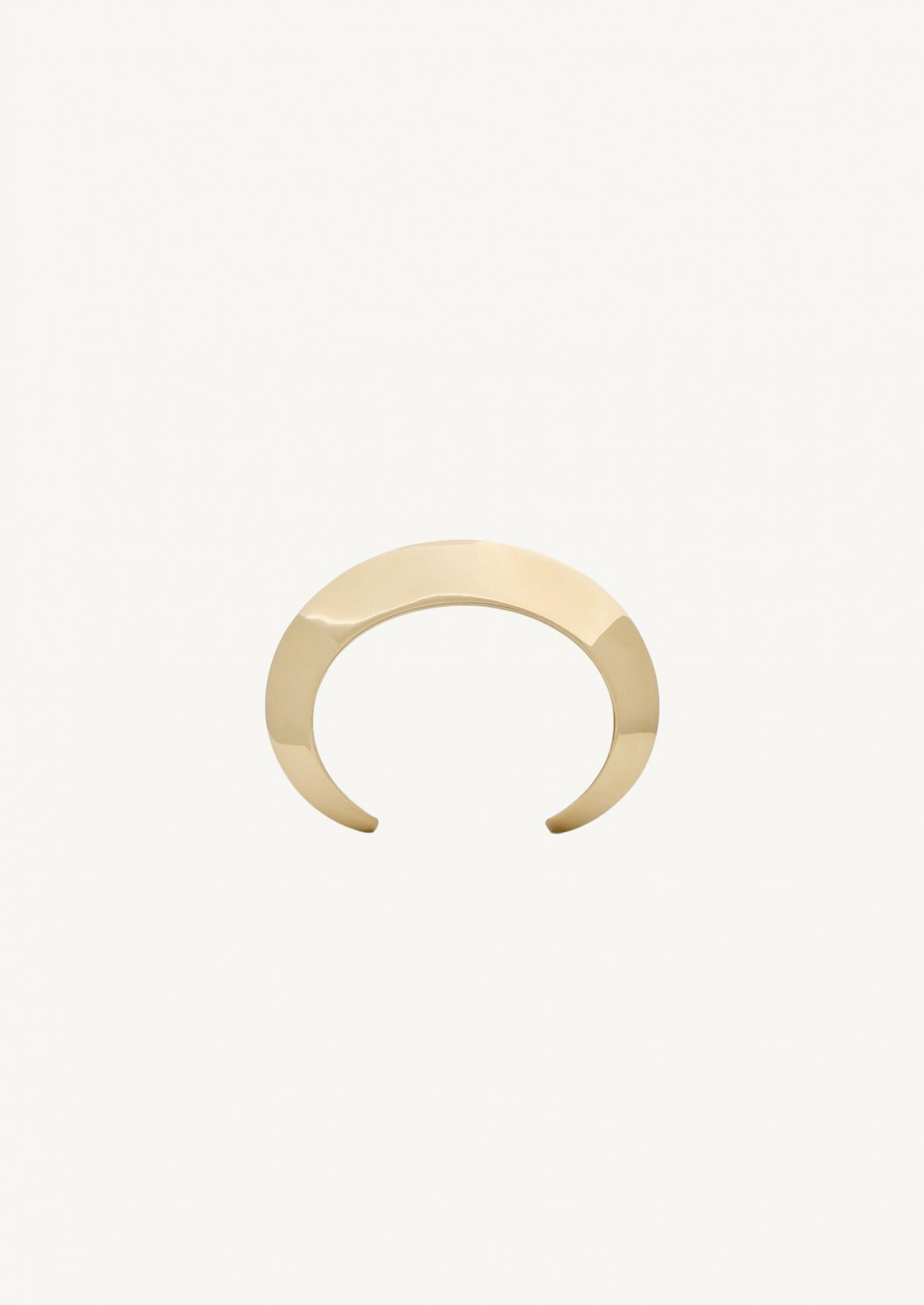 Grooved cuff in gold-plated metal